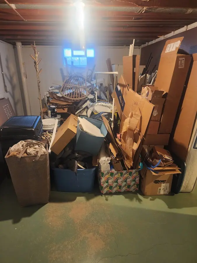 Roll-off dumpster container at job site for 2 Yard Dumpster Rental in Ridge Wood Heights